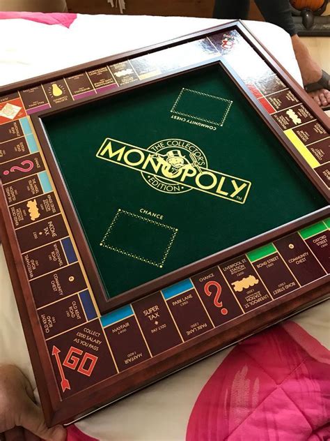 limited edition monopoly in square metal box|rare monopoly board game.